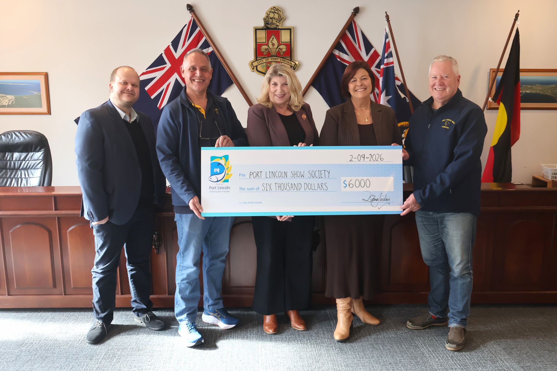 Picture: Show Society representatives receive a grant cheque from Mayor Diana Mislov and CEO Eric Brown