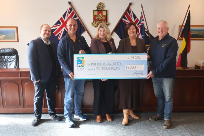 Picture: Show Society representatives receive a grant cheque from Mayor Diana Mislov and CEO Eric Brown