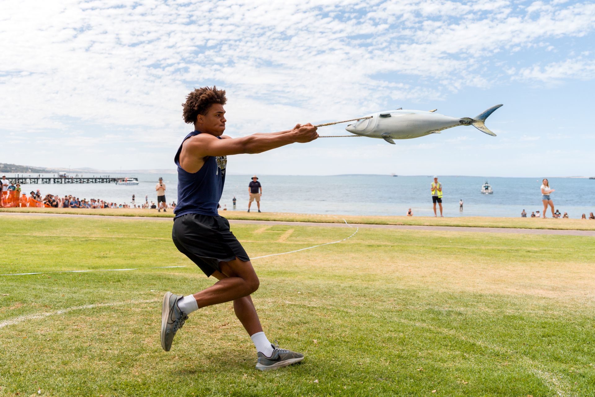 Picture: a contestant competing in the Tuna Toss