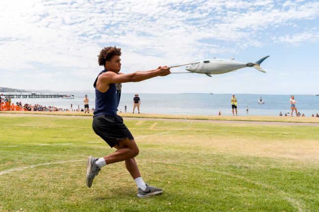 Picture: a contestant competing in the Tuna Toss